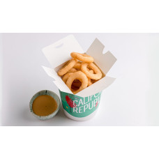 Цибулеві кільця фрі з барбекю соусом